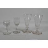 A pair of Georgian ale glasses, a Georgian illusion glass, and another, largest 6" high