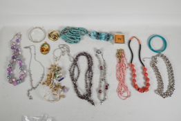 A quantity of costume jewellery, including coral and turquoise beads, diamante etc