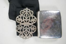 A silver plated nurses buckle with pierced and engraved floral decoration, 3½" x 2½", and a