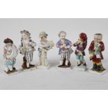 Six Meissen porcelain figurines, three musicians and three others, with some faults, 4" high
