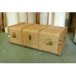 A vintage steamer trunk with beechwood straps and metal mounts, 36" x 20" x 13"