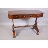 A C19th flame mahogany centre table, with two true and two false drawers, the top with rosewood