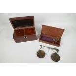 A mahogany cased set of gold scales, 8" long and a small mahogany, two compartment tea caddy