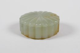 A Chinese carved celadon jade box and cover, 2" diameter