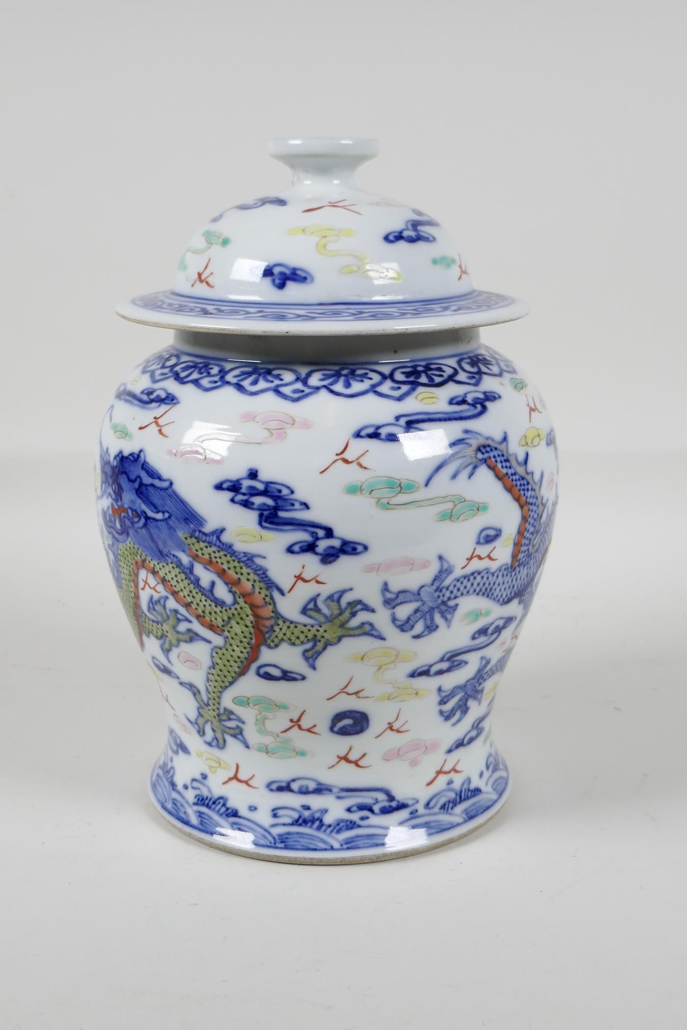 A Chinese polychrome porcelain meiping ginger jar & cover, decorated with dragons chasing the - Image 3 of 5