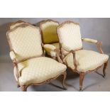 A pair of French style carved beechwood open arm chairs and a matching pair of standards, with