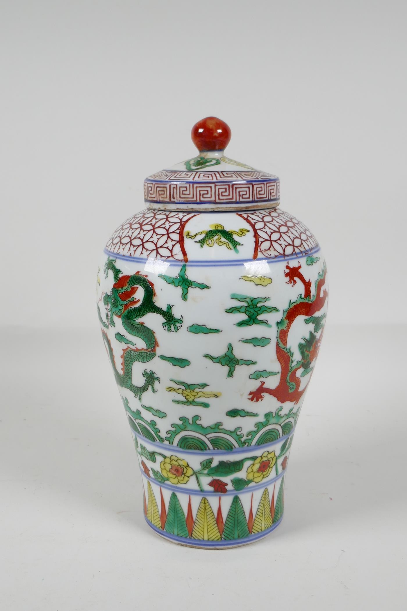 A Chinese Wucai porcelain Meiping jar & cover, decorated with dragons chasing the flaming pearl, 6 - Image 4 of 6