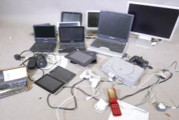 A quantity of laptops, DVD players, Sony Playstation tablets etc, (all untested), Playstation