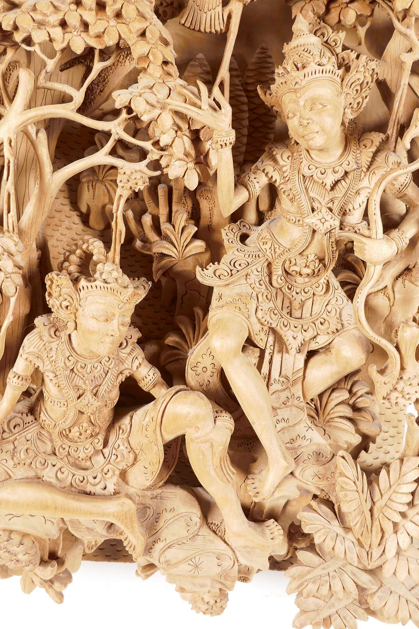A Balinese carved sandlewood wall plaque, carved as two dancers resting under a tree, 16" x 9½" - Image 6 of 6