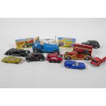 A vintage mini toys clockwork racing car, 5" long,  and a quantity of small toy cars, including