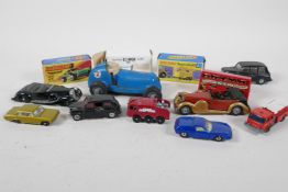 A vintage mini toys clockwork racing car, 5" long,  and a quantity of small toy cars, including
