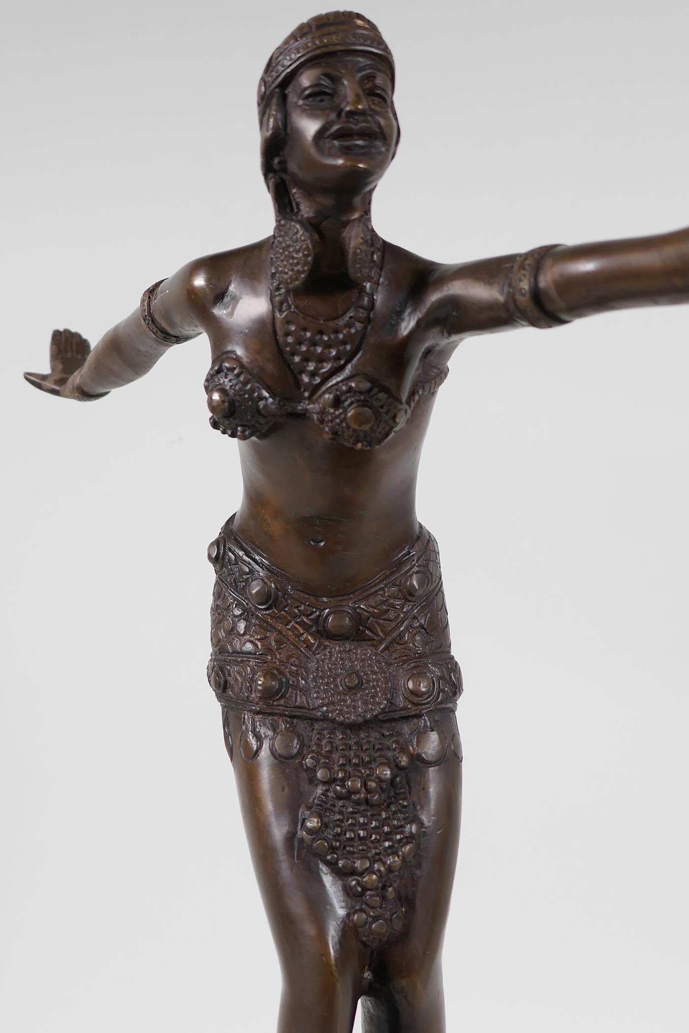 A bronze figurine of a dancer, on a stepped hardstone base, after F. Preiss. 16½" high - Image 3 of 4