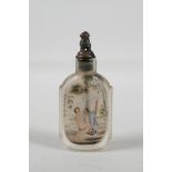 A Chinese reverse decorated glass snuff bottle with erotic decoration & character inscription verso,