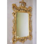 A Chinese Chippendale style giltwood wall mirror, 64" x 31"