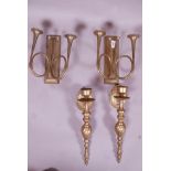 A pair of brass two branch wall candle sconces in the form of hunting horns, 10" high, and another