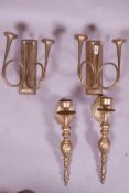 A pair of brass two branch wall candle sconces in the form of hunting horns, 10" high, and another