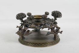 A Japanese Meiji period bronze koro stand, with chrysanthemum decoration, 5½" high x 8" diameter