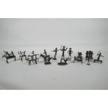 A collection of Antique African Benin bronze figures, with some on horseback, the largest 3" high