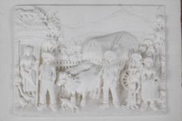 A framed Parian plaque, depicting country folk bringing home the harvest, 5½" x 4"