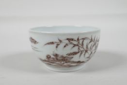 A Ming style red & white porcelain tea bowl, decorated with waterfowl in a pond, Chinese, 6