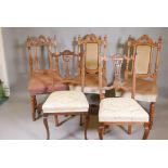 A pair of Edwardian walnut Grecian style chairs with carved and pierced backs, and three C19th