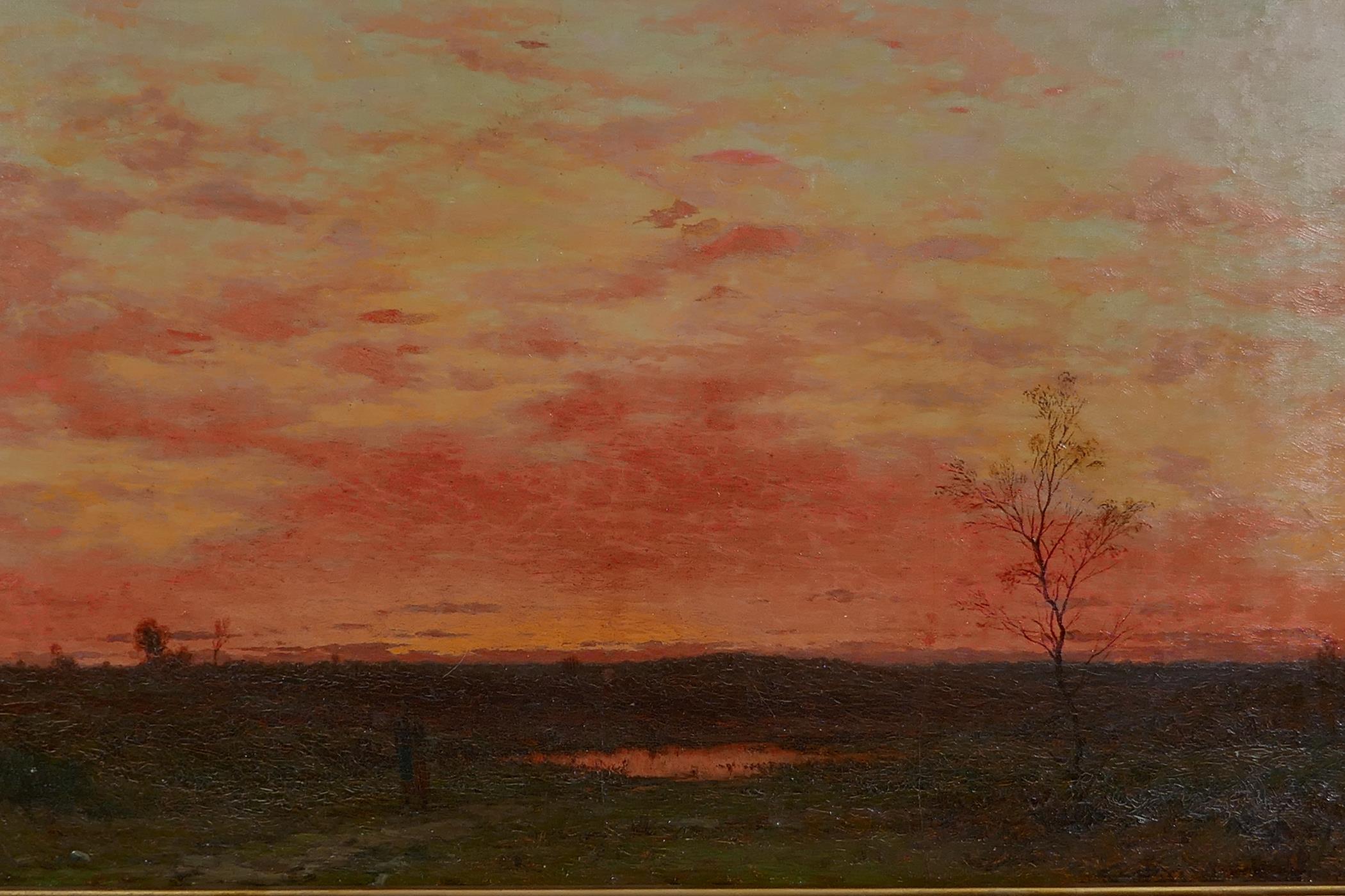 Frederick W. Meyer, monogrammed oil on canvas, 'Figure in a Landscape at Sunset', 12" x 19½"