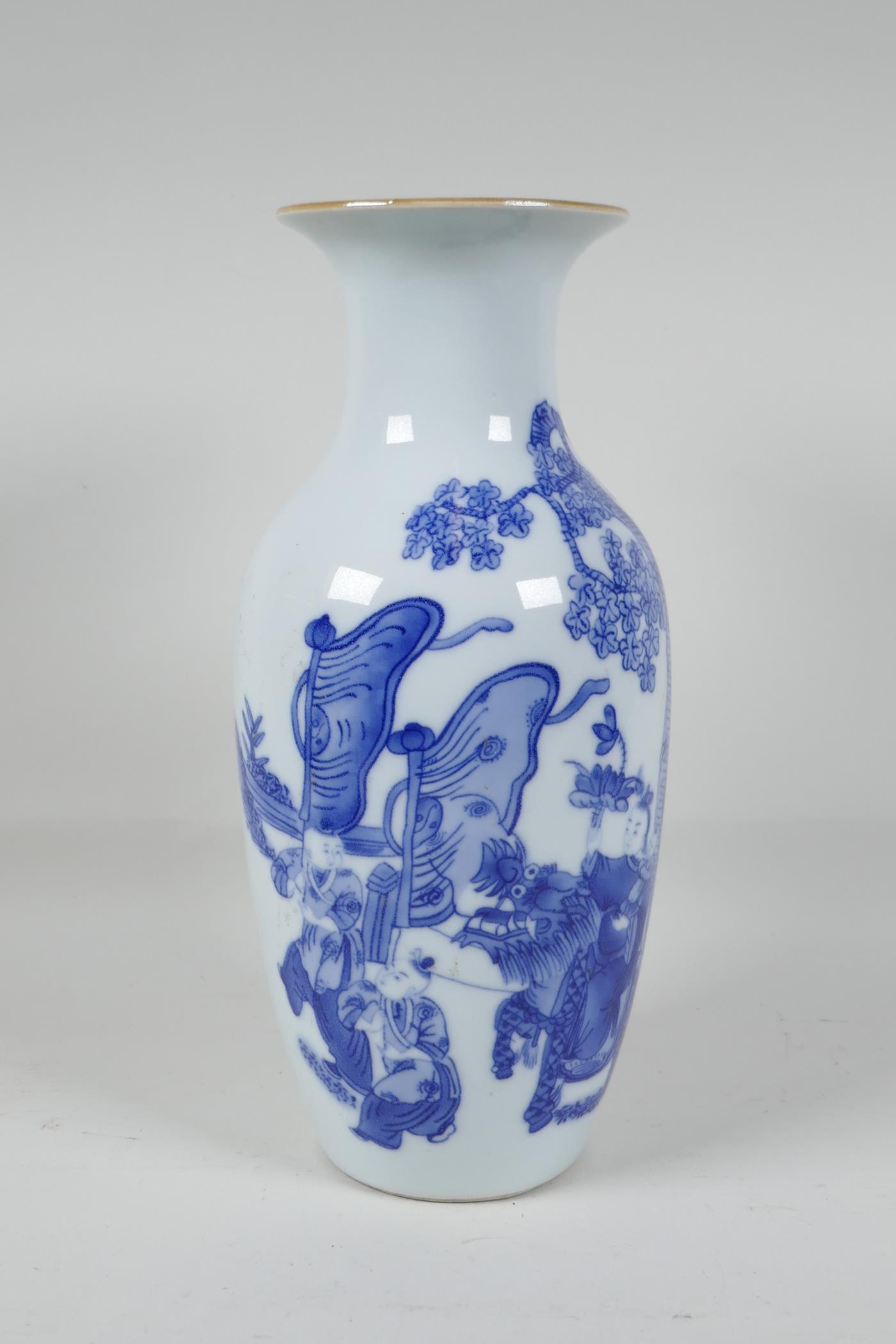 An early C20th Chinese blue & white porcelain vase, decorated with women, children and a kylin in a