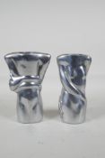 A pair of Carrol Boyes pewter figural candlesticks, signed, 6" high