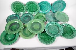 Sixteen green "Cabbage Leaf" Majolica plates, largest 9½"