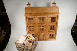 A scratch built dolls house and a quantity of furniture and accessories, 22" wide, 28" high