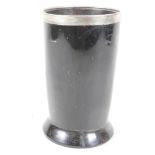 An antique horn beaker with white metal rim, 4½" high