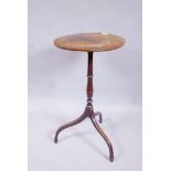 A Georgian mahogany wine table, the oval top with matched quarter veneer and crossbanded edge,