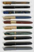 Ten Waterman fountain pens, including Ideals, W5s, W2s, a Taperite, a 575 and an 877, seven