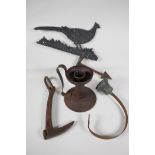An Arts & Crafts iron candlestick, 7" high, an aluminium "Pheasant" weather vane, a wrought iron