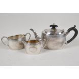 A C19th silver plated three piece Batchelor tea service of classical design, the teapot with