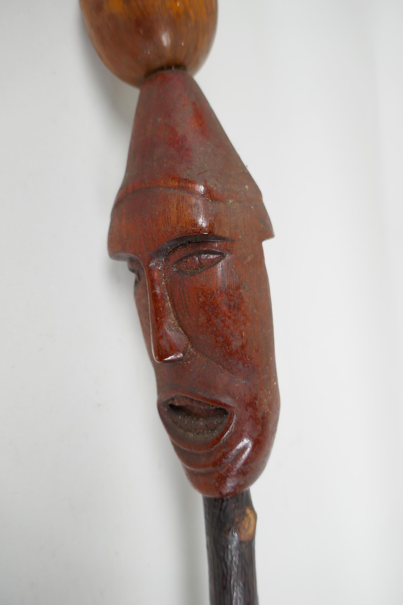 An African wood walking stick, with carved wood head with hedgerow shaft and later handle, 43" long - Image 2 of 4