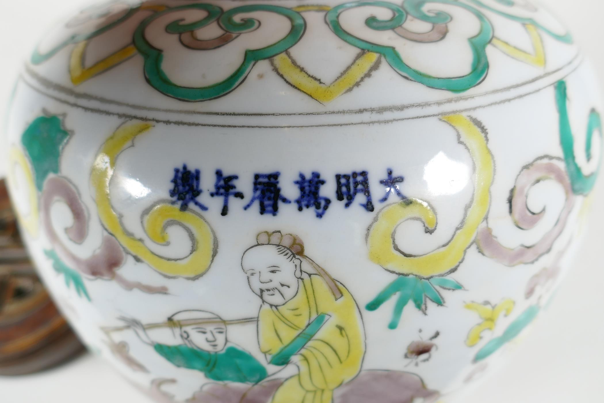 A Chinese Sancai glazed porcelain ginger jar with a turned wood cover, decorated with figures riding - Image 8 of 8