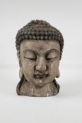 A Chinese carved & painted wood bust of Buddha, 9½" high