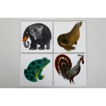 A set of four Kenneth Townsend porcelain tiles, depticting an elephant, frog, cockerel & seal