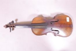 An antique violin, the one piece back with grain painted decoration, 23" long