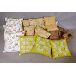 A quantity of assorted vintage scatter cushions, including three Habitat elephant cushions