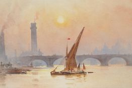 A Thames scene with sailing barge and the old London Bridge and St Pauls in the background,