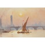 A Thames scene with sailing barge and the old London Bridge and St Pauls in the background,
