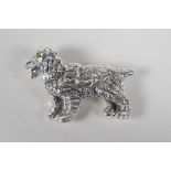 A sterling silver brooch in the form of a Spaniel, 2" long