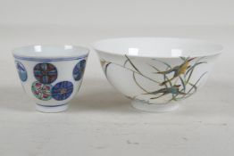 A Chinese Republic style porcelain rice bowl with waterfowl and reed decoration, and a polychrome