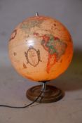 A vintage illuminating terrestrial globe, 16" high