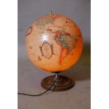 A vintage illuminating terrestrial globe, 16" high