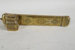 An engraved eastern brass scribes box, 8" long