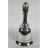 A silver plated cocktail shaker in the form of a handbell, (dented), 11" high