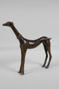 A Persian filled bronze figure of a greyhound, 8½" high, 9" long